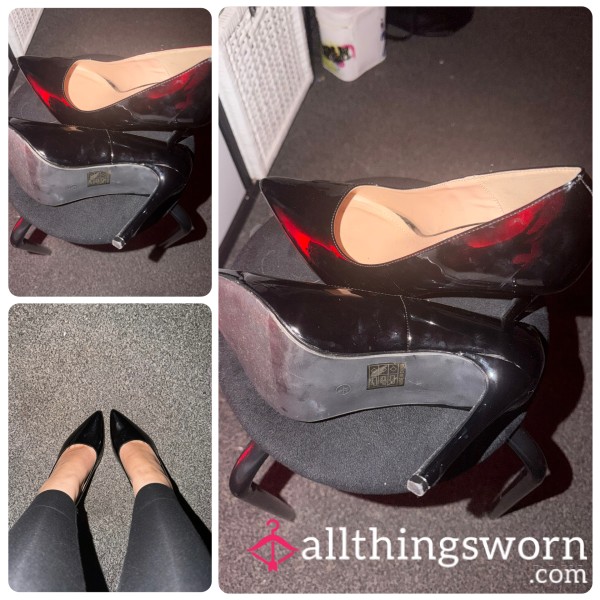 Worn Black Closed Toe High Heels