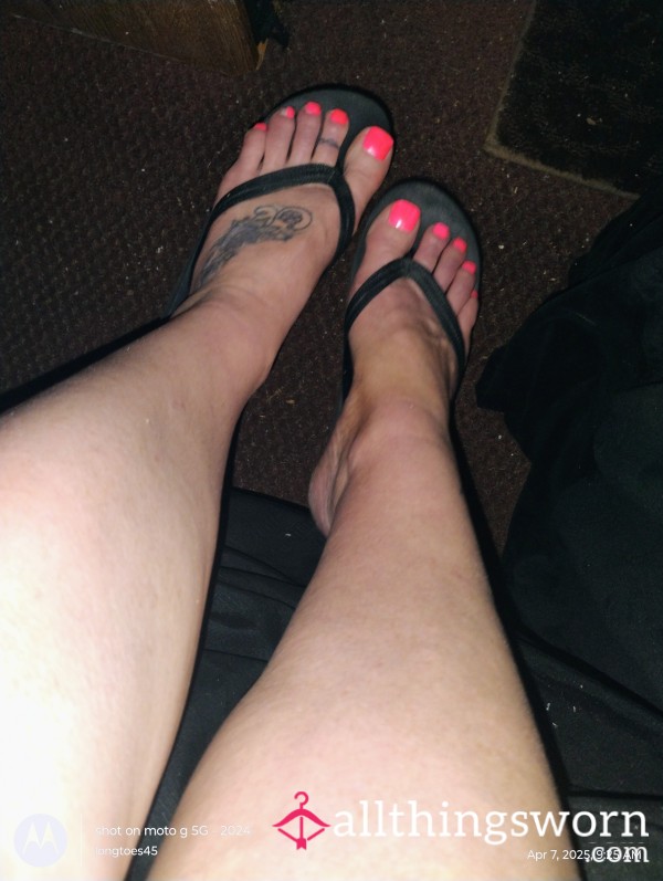 Worn Black Flip Flops