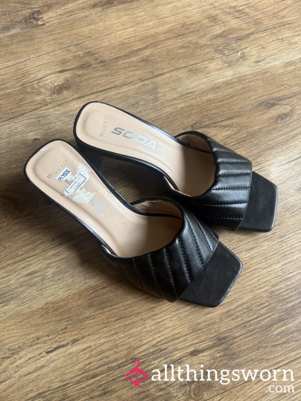 Worn Black Heels