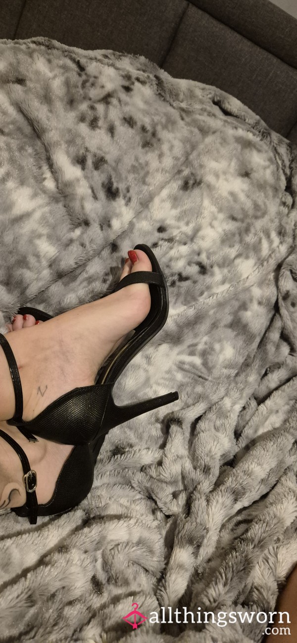 Worn Black Heels