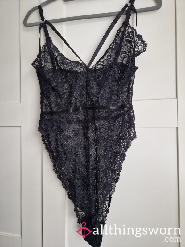 Worn Black Lace Bodysuit