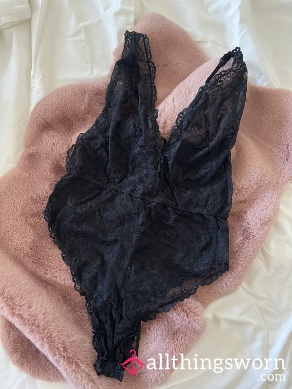 Worn Black Lace Bodysuit