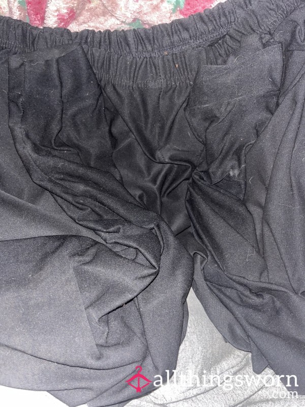 2 Pairs Of Worn Black Leggings