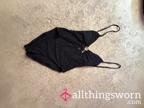 Worn Black One Piece Swim Suit