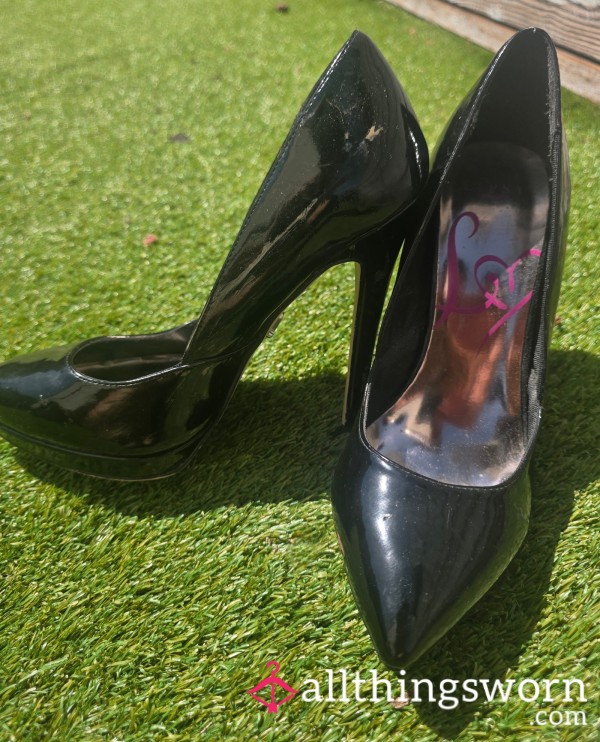 Worn Black Patent Platform Stilettos