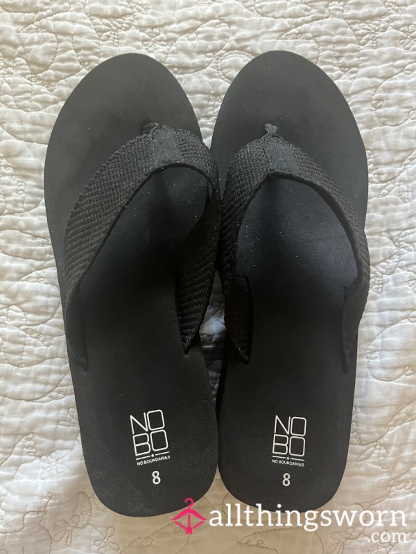 Worn Black Platform Flip Flops