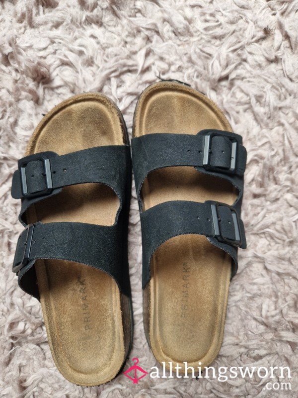 Worn Black Sandals
