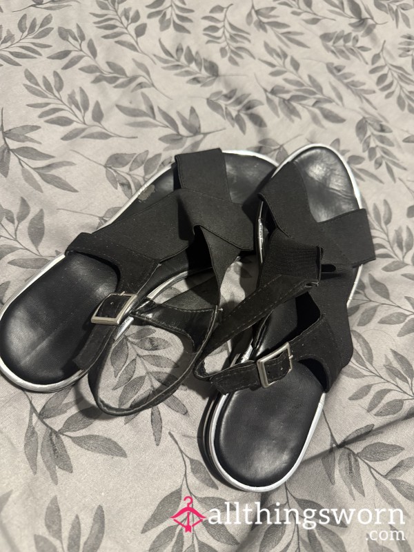 Worn Black Sandals