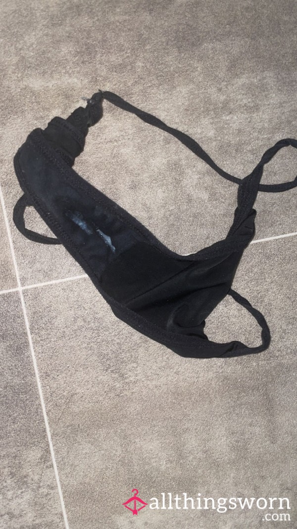 Worn Black Thong