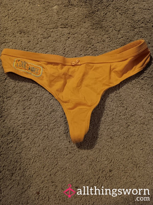 Worn Bright Orange Thong – Flirty, Fitted, And Deeply Marked From Wear