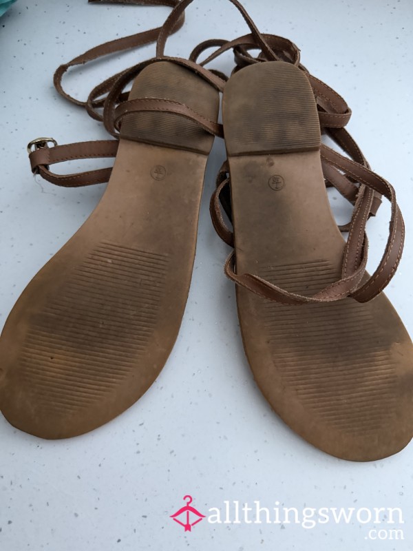 Worn Brown Gladiator Sandals