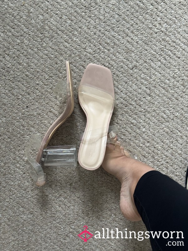 Worn Clear High Heels