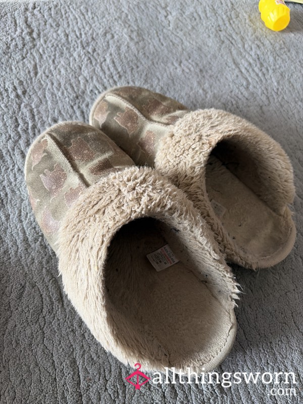 Worn Highland Cow Slippers