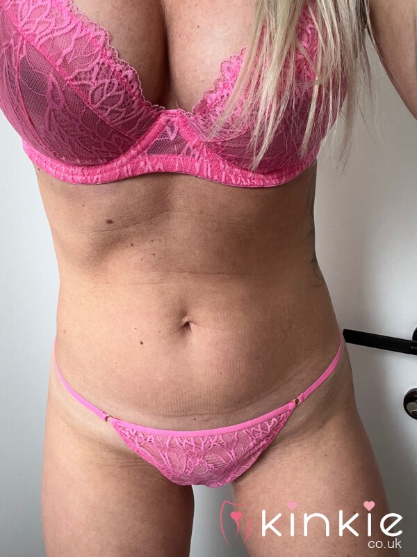 Worn Hot Pink Thong And Matching Bra Lingerie Set