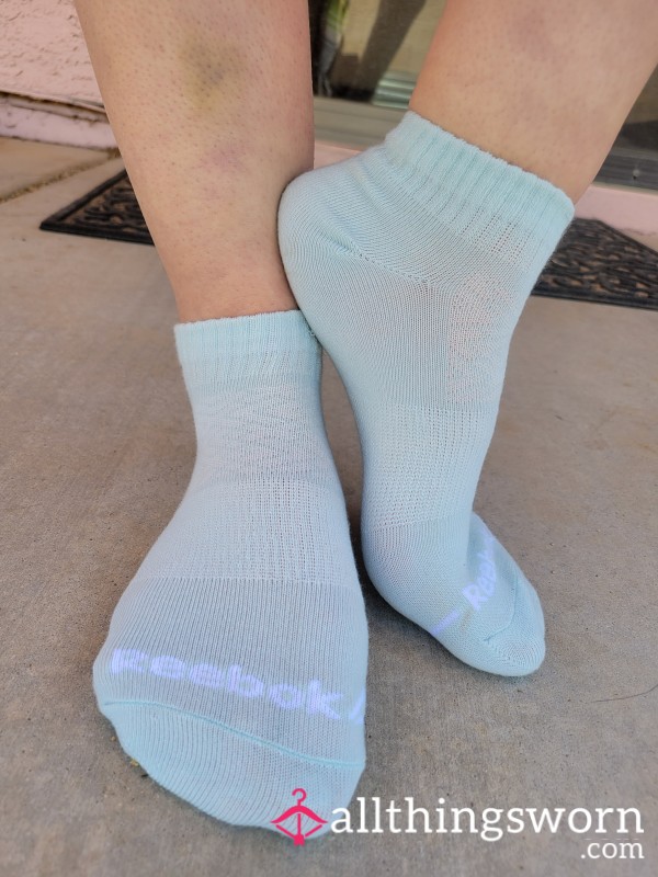 Worn Light Blue Reebok Socks- Flirty, Funky, And Full Of Personality