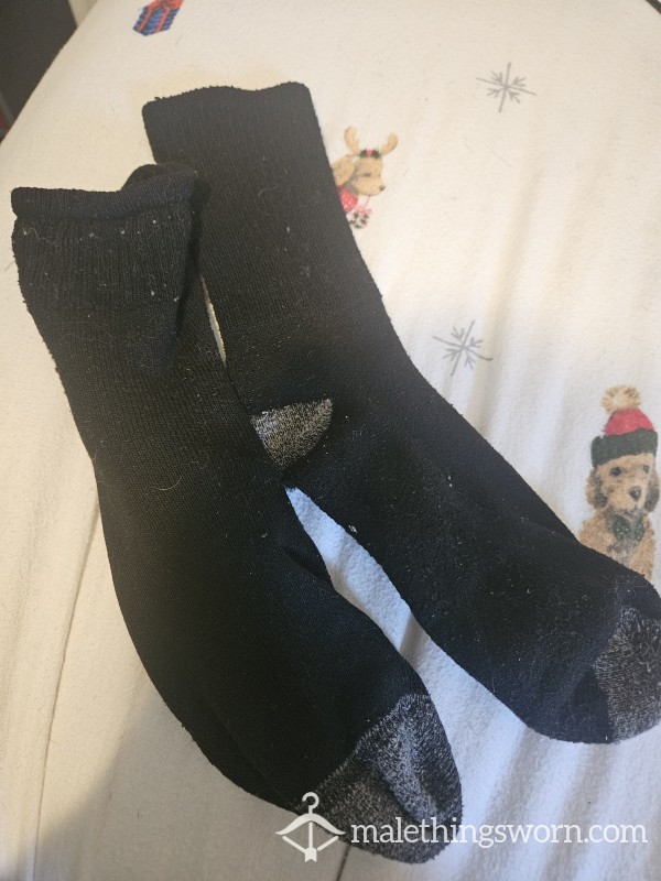 Worn Long Black And Grey Socks Stretched By Large Feet