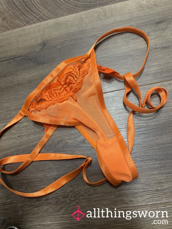 Worn Orange Thongs