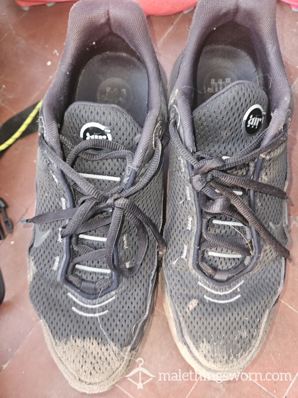 Worn-out Nike Trianers