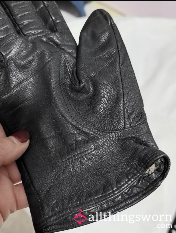 Worn-out Winter Leather Gloves