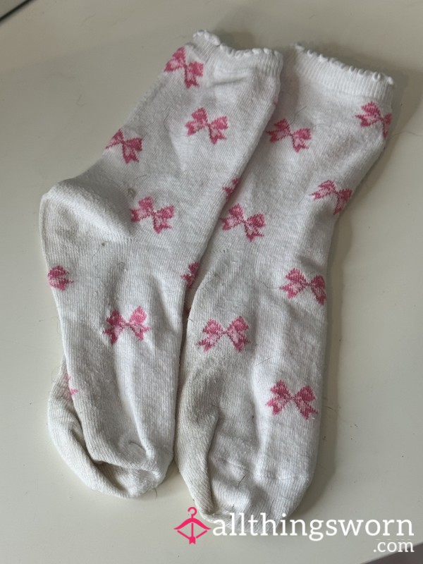 Worn Pink And White Bow Socks