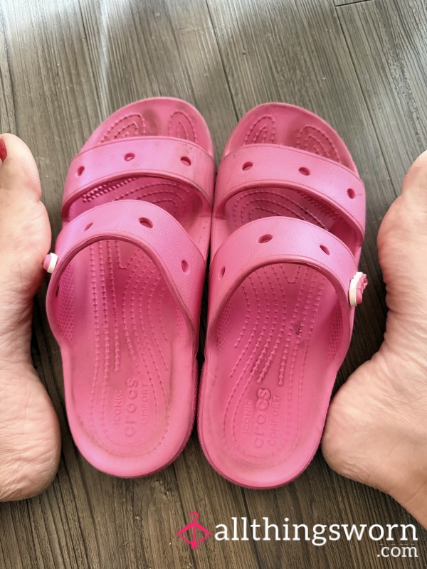 Worn Pink Croc Sandals