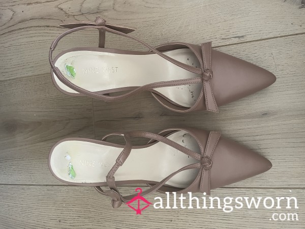 Worn Pink Heels