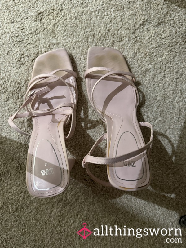 Worn Pink Heels