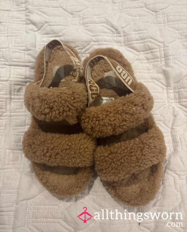 Worn Slippers With Footprint