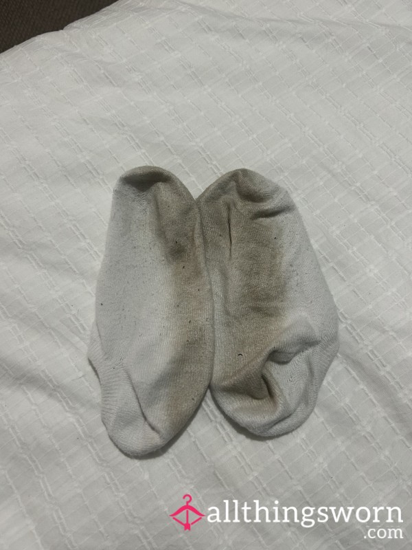 Worn Socks From Day At Work And Outdoor Play