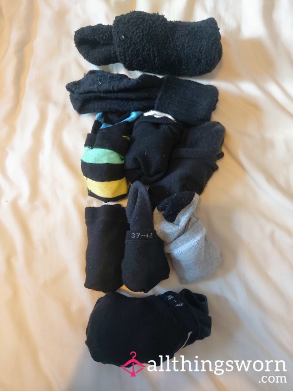 Worn Socks - Varying Sizes, Designs, And Conditions