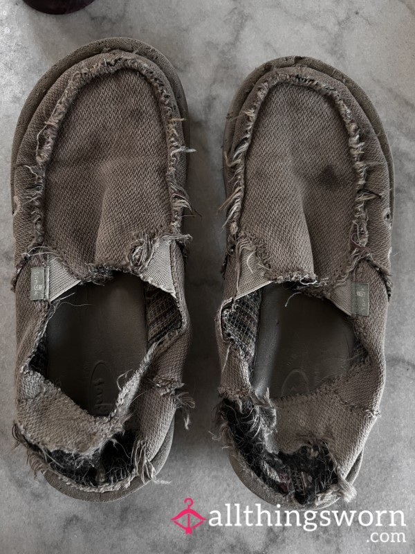 Completely Worn Out Sanuk Flats.