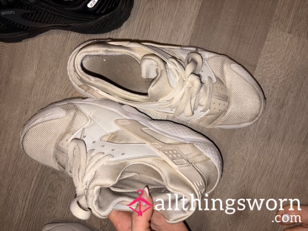 Worn White Nike Sneakers