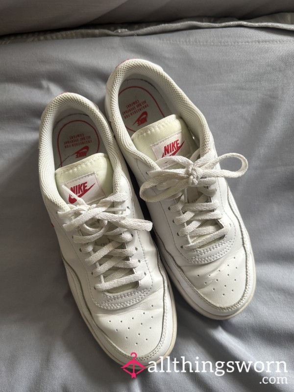 Worn White Nike Trainers