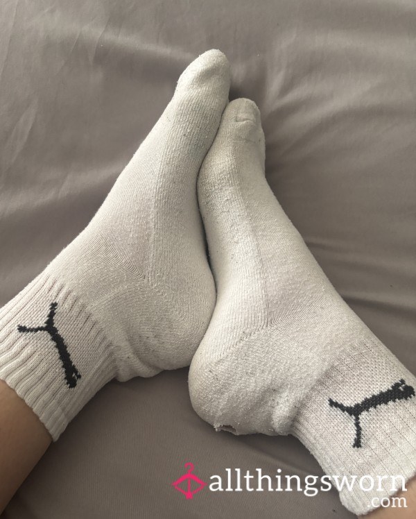 Worn White Puma Sports Socks With Hole