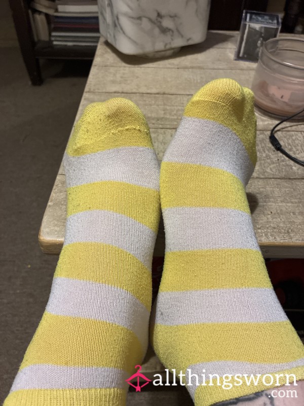 Worn Yellow And White Socks