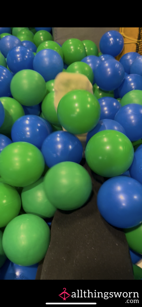 Yellow Socks  Playing In Ball Pit
